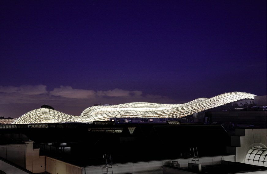 The distinctive design is a highlight of the Chadstone Shopping Centre, blazing the message of modern construction into the night.