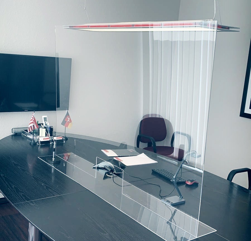 Shops and hospitals are not the only place where being protected from coughs and sneezes is necessary. Here you see the desk in a solicitor's office.