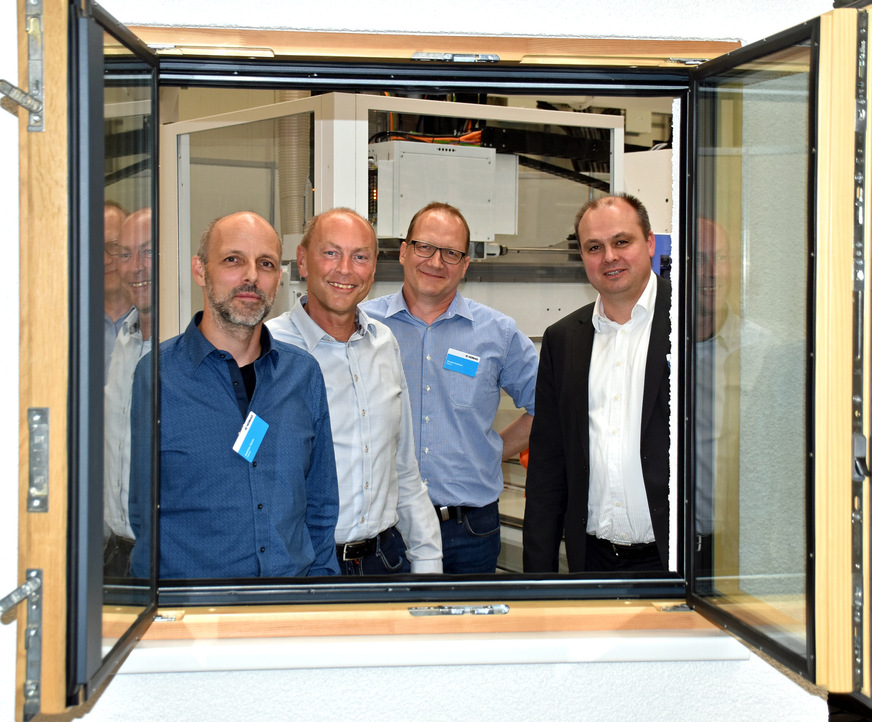 Proudly presenting the new compound system (from right): Volker Schmieder (Homag Manager Technical Sales BU- Systems), Claudio Mathiuet (tesa Key Account Manager Industry), Andreas Busch (tesa Key Account Manager Industry Germany), Matthias Weets (tesa Application Solution Engineer).