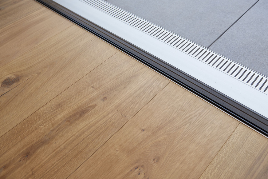 Blurring the boundary between indoors and outdoors: the sill-less glass facades