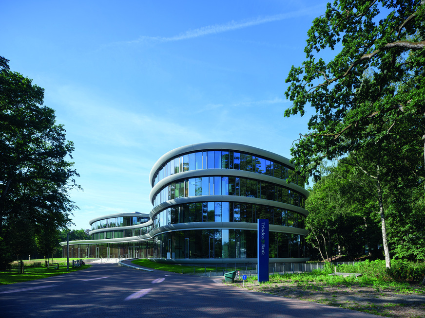 The Triodos Bank office building sets international standards for circular construction as a completely demountable, energy-neutral building with a wooden structure and a glass facade.