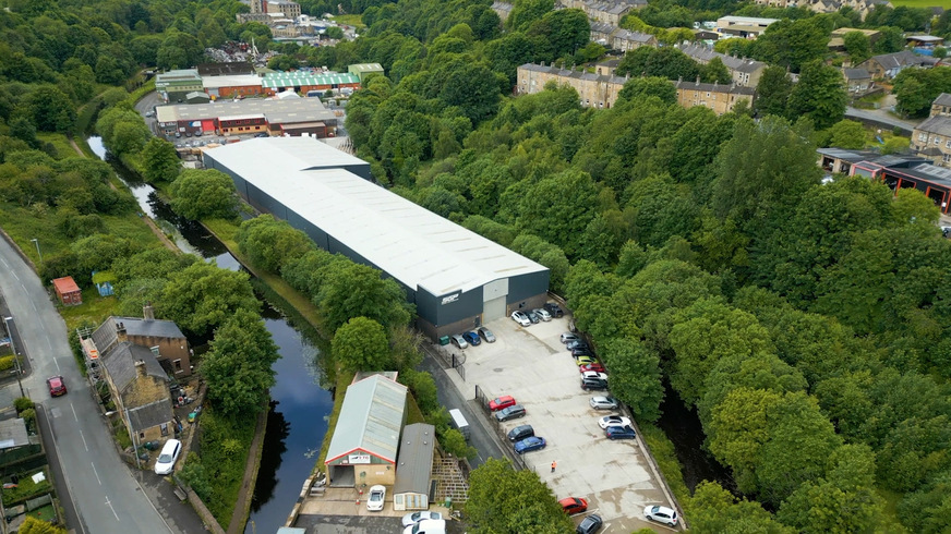 Aerial view of the SGP factory in Huddersfield: 75,000 square feet of production space for sophisticated architectural glass processing.