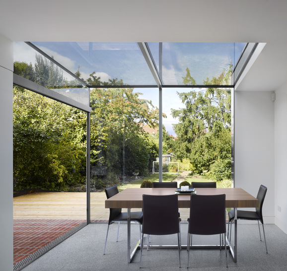 The glass coating uses UV light to break down dirt particles, which are then washed away with the next rain fall.