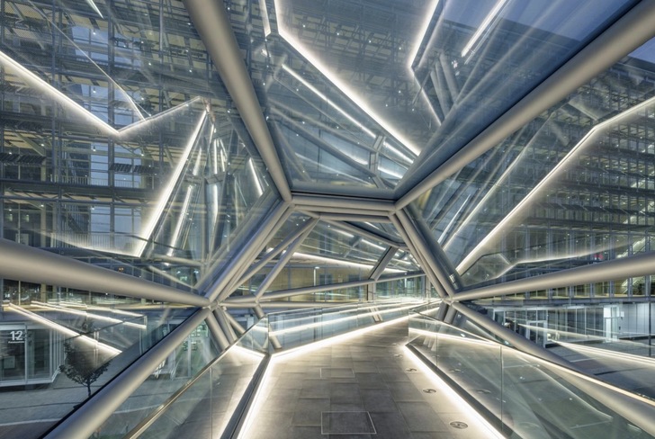 The new Capricorn Bridge in Düsseldorf's Medienhafen looks like a glass diamond. The construction was realised by seele. - © HG Esch
