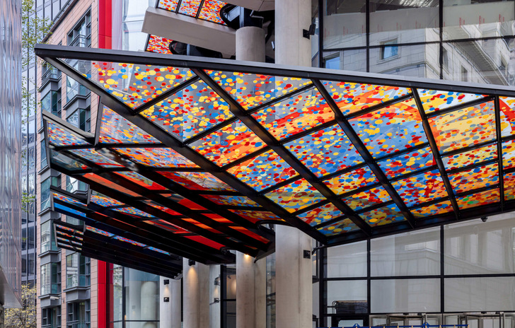 The printed canopies at 22 Bishopsgate give passers-by the impression of walking under a shower of confetti.