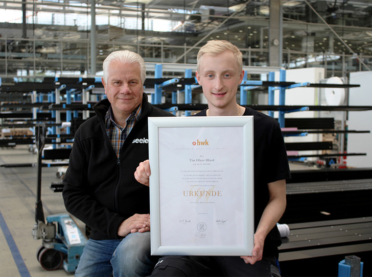 Andreas Hurler, trainer for industrial apprentices at seele, is proud of his young colleague: Tim Blank has become the best graduate in the profession of metal worker construction technology in the German region of Swabia.
