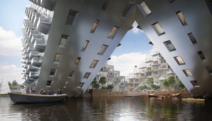 Some of the flats of the "Sluishuis" in Amsterdam IJburg are positioned at a steep angle above the water. - © Barcode Architects
