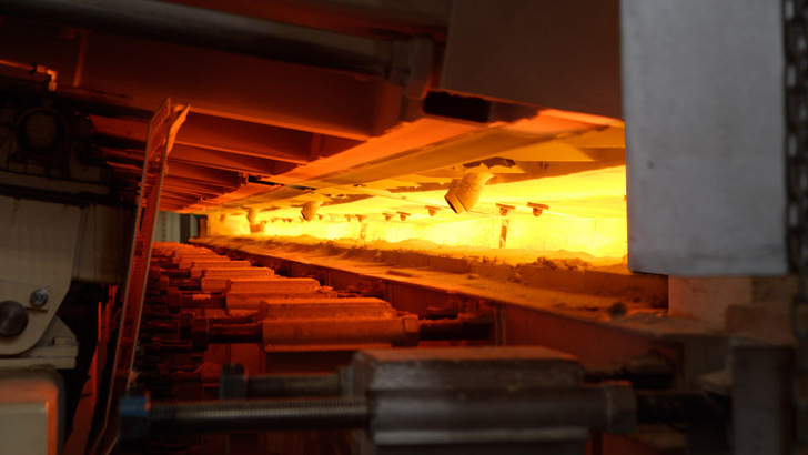 View into the melting zone of a float glass line, fired with natural gas.