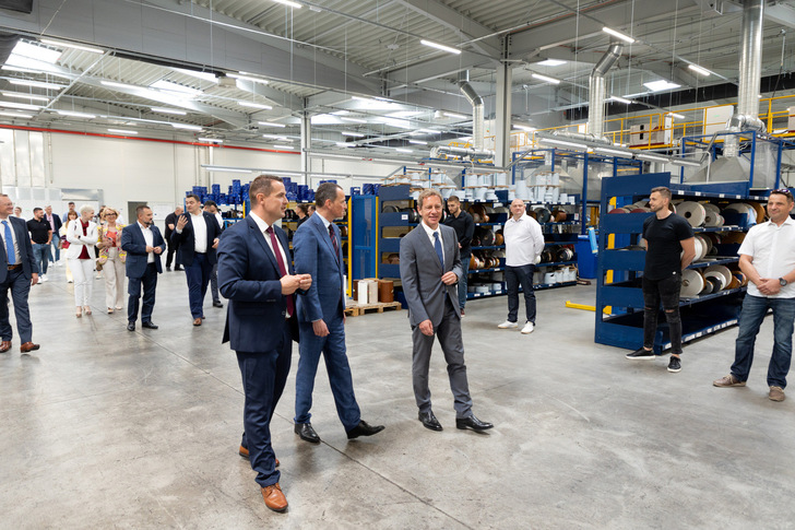 During the site visit, Josip Klasic, Managing Director Deceuninck Croatia, leads Belgian Ambassador Nicolaas Buyck and Bruno Humblet (from left to right) through Deceuninck's new and innovative offices and production facility in Croatia. - © Deceuninck
