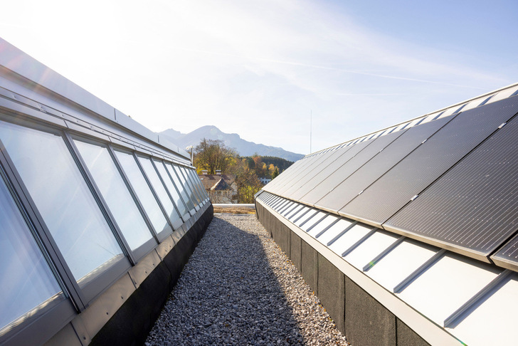 The north side of the shed roof is used for daylight penetration through the Velux Modular Skylights, the south side for electricity generation through photovoltaic modules.