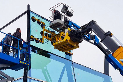 Glazing with Heavydrive's assembly crane in combination with the overhead manipulator.