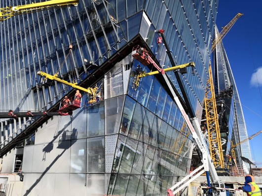 Placing the windows under a three metre deep overhang in an inclined position with millimetre accuracy.