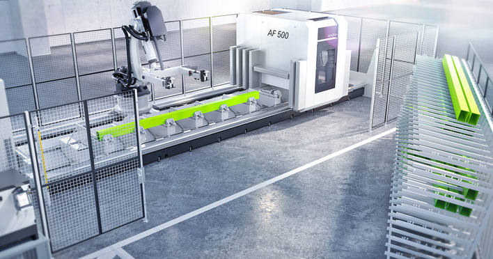 Schüco RX LOAD 500 is a robotic cell consisting of the Schüco CNC machine AF 500 and a robot with linear traversing unit, safety fence and mobile rack for the profiles.